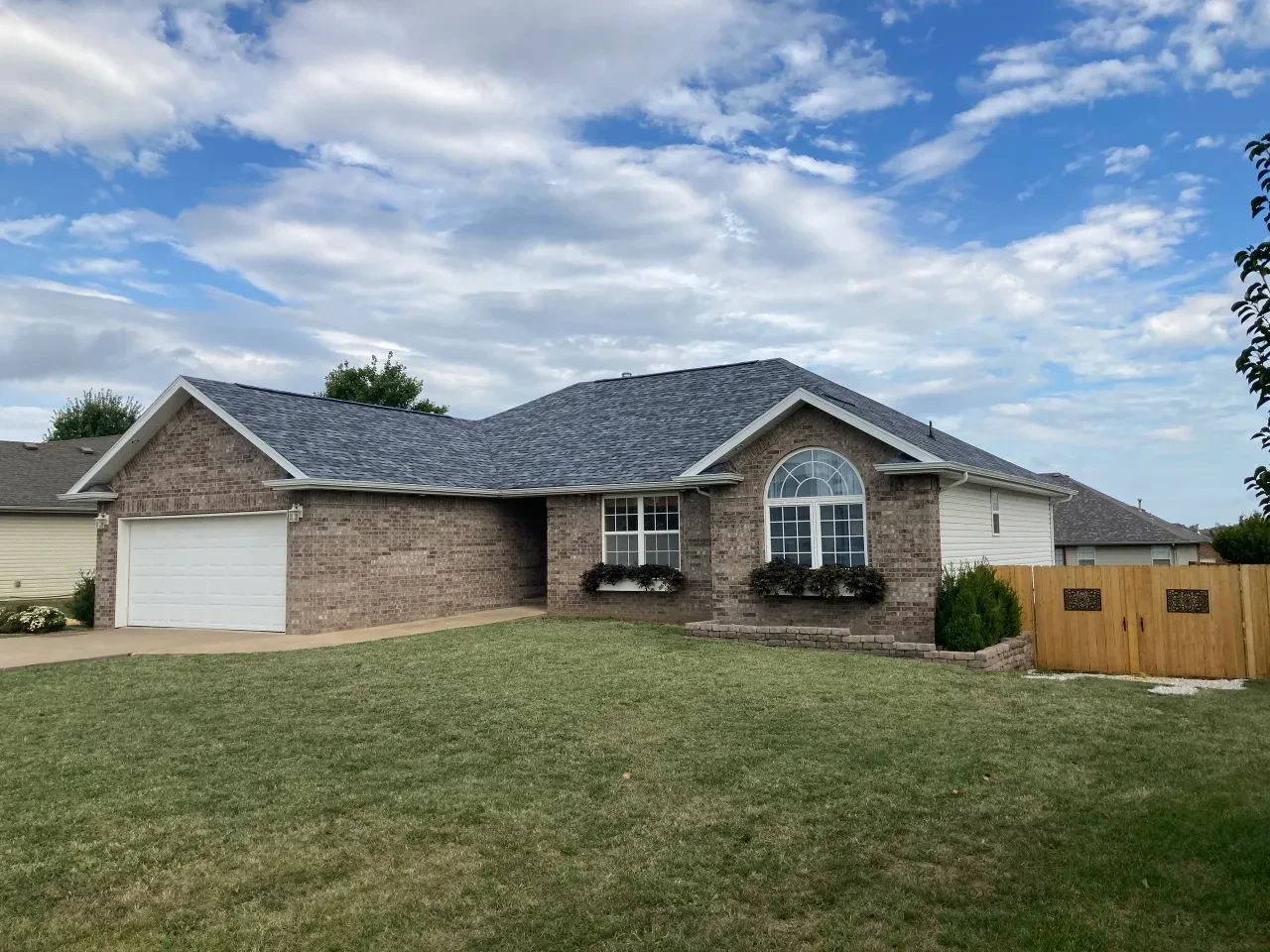Brick ranch home exterior with two-car garage